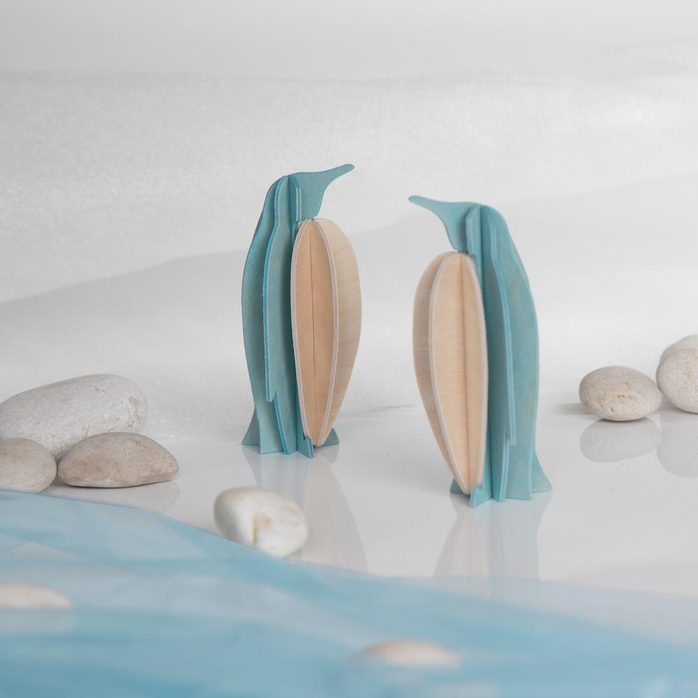 Lovi-pingviinit rannalla, koottava puinen hahmo